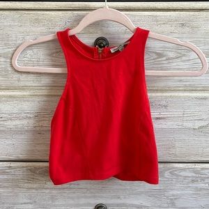 Red top with gold zipper from Charlotte Russe, size XS.